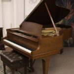 Steinway Mahogany Model B Grand Piano And Bench. Sold For $15,600