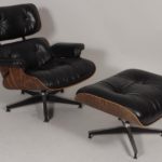 Charles And Ray Eames For Herman Miller, Black Leather Lounge Chair & Ottoman. Sold For $3,656