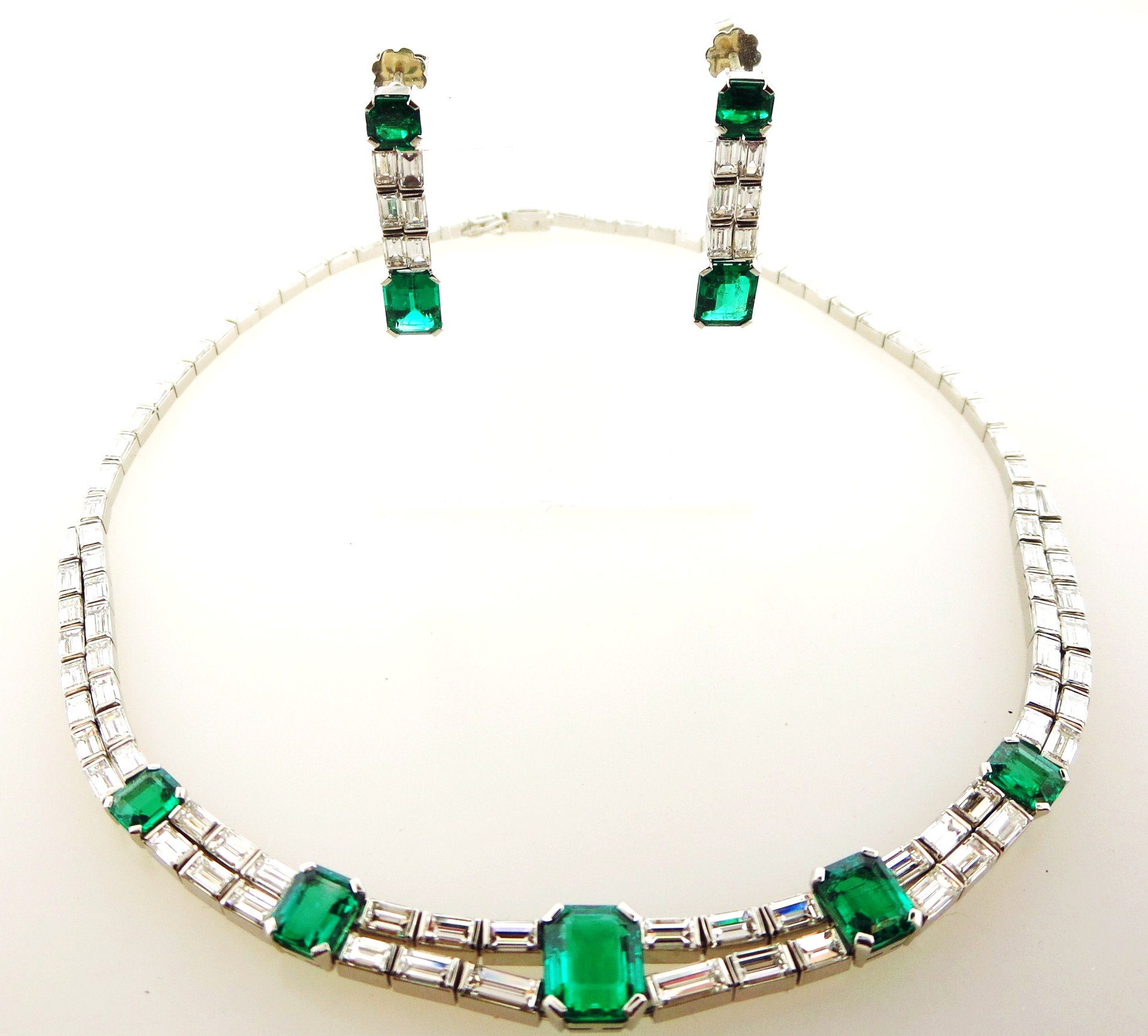 Emerald, Diamond And Platinum Necklace & Earrings. Sold For A Combined Price Of $56,250