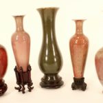 5 Chinese Porcelain Sang De Boeuf Vases. Sold For $8,775