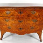 A Rococo Bombe Inlaid Burl Fruitwood Commode, Italian, 18th C. Sold For $21,600.