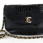 Black Alligator Chain Handle Shoulder Bag By Chanel. Sold For $2,625.