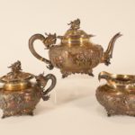 Chinese 3-Piece Silver Tea Set By Wang Hing. Sold For $8,775