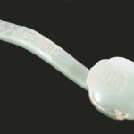 Chinese Carved Celadon Jade Ruyi Sceptre. Sold For $97,656