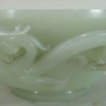 Chinese Pale Celadon Carved Jade Bowl. Sold For $18,818.
