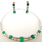 Emerald, Diamond And Platinum Necklace & Earrings. Sold For A Combined Price Of $56,250.