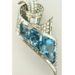 Fancy Emerald Cut Aquamarine, Round & Baguette Diamond Platinum Brooch. Sold For $15,000.