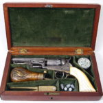 Fine Cased Factory Engraved Gustave Young Colt Pocket Revolver, 19th C., Model 1849. Sold For 9,000.
