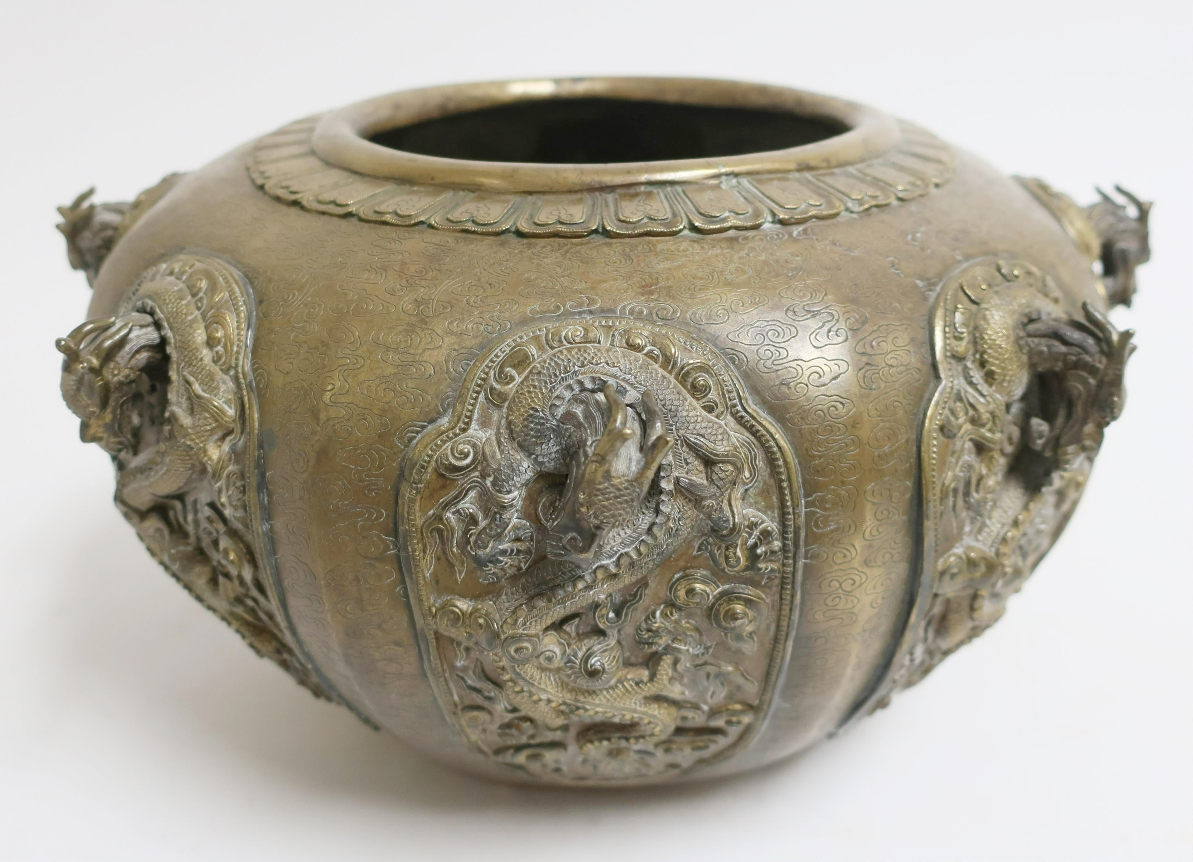Large Bronze Dragon Pot. Sold For $7,475
