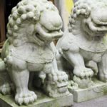 Pair Of Massive Marble Foo Lions On Plinths. Sold For $3,500