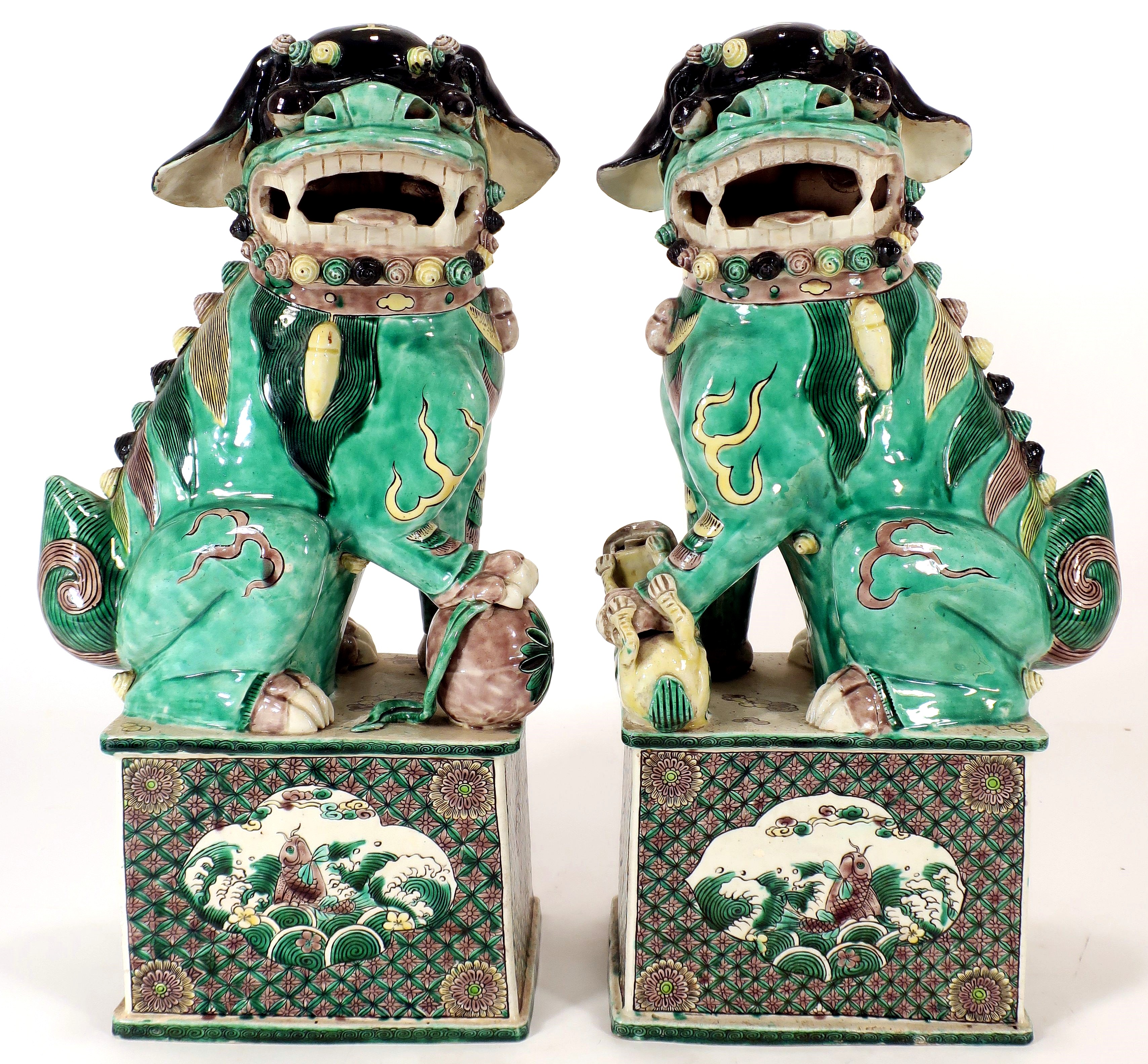 Pair Of Chinese Famille Verte Foo Lions, 19th C. Sold For $4,500
