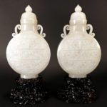 Pair Of Chinese White Jade Vases With Covers. Sold For $14,375