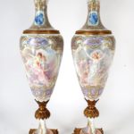 Pair Of Large Hand-Painted Porcelain Ormulou Mounted Urns. Sold For $4,750