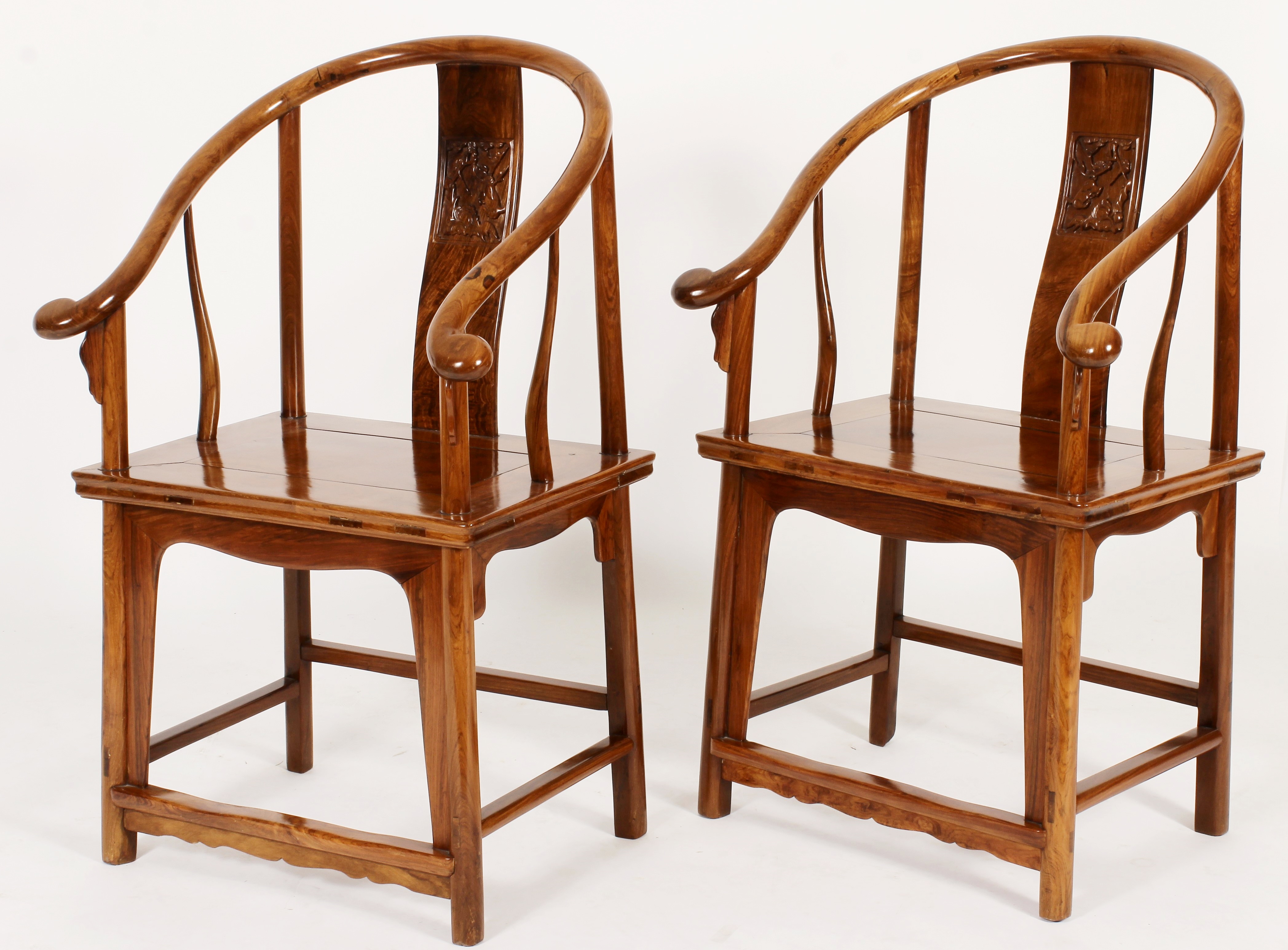 Pair Of Ming Style Horseshoe Back Arm Chairs. Sold For $18,750
