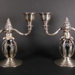 Pair Of Sterling Silver Two-Light Candlesticks By Georg Jensen. Sold For $13,750.