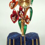 Parisian 18k Gold, Diamond & Cloisonne Flower Clock On Lapis Lazuli Base. Sold For $4,500.