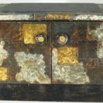 Paul Evans, New Hope, PA, 1931-1987, Metal Patchwork Side Cabinet, PE-38 C. 1960’s. Sold For $14,400.