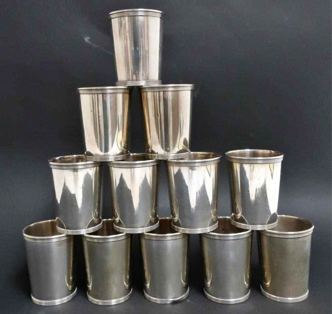 Set Of 12 Sterling Silver Mint Julep Cups By Alvin. Sold For $4,290