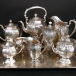 Sterling Silver 9-Piece Tea Set, J. E. Caldwell, Philadelphia. Sold For $7,937.
