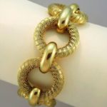 Tiffany And Co. 18K Gold Round Link Bracelet. Sold For $5,375.