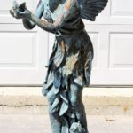 Victorian Cast Iron Angel Holding Songbird, 19th C. Sold For $4,000